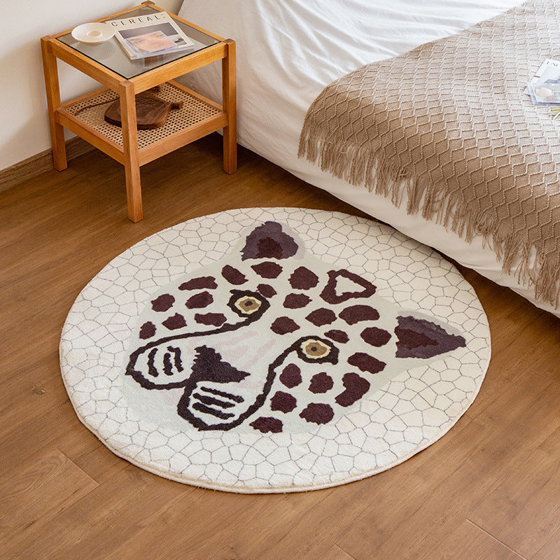 Round living room rug with graphic diamond pattern and soft short pile Kalsten