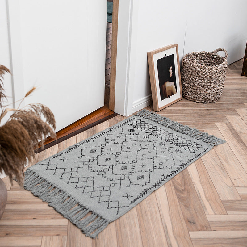 Flat-woven entrance and living room rug with Moroccan diamond jacquard and decorative fringes Kalsten