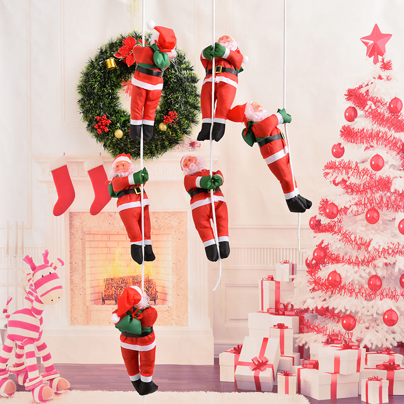 Decorative Santa Claus figures in climbing style