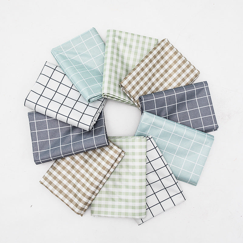 Wipeable tablecloth with fine check pattern, wavy hem and easy-care PVC finish Kalsten