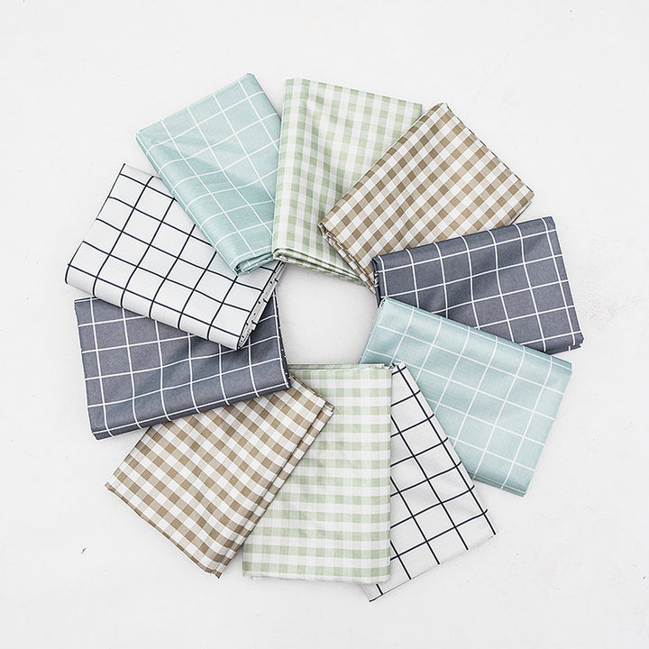 Wipeable tablecloth with fine check pattern, wavy hem and easy-care PVC finish Kalsten