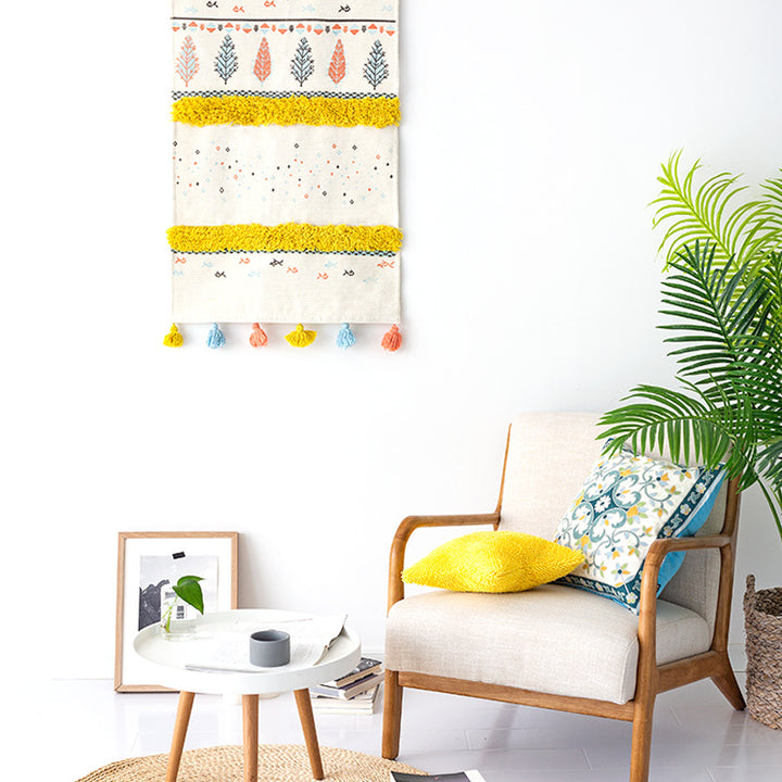 Wall tapestry in Scandi-Boho style with tufting stripes, tassels, and wooden rod Kalsten