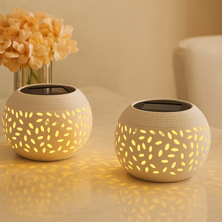 Solar-powered table lamp with punched pattern Kalsten