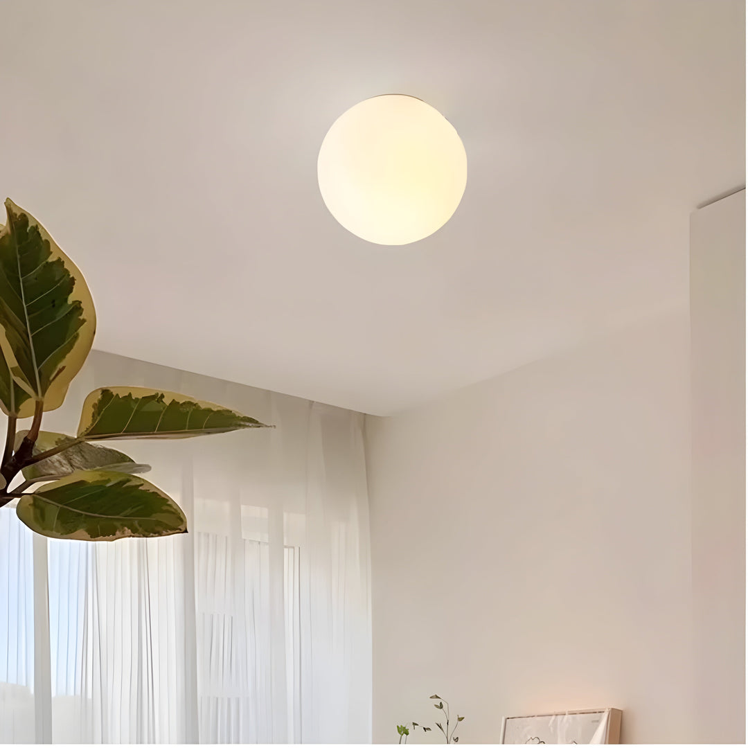 GlasAura Wall Lamp with Matte Glass Ball and Metal Base | Kalsten