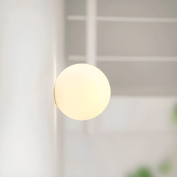 GlasAura Wall Lamp with Matte Glass Ball and Metal Base | Kalsten