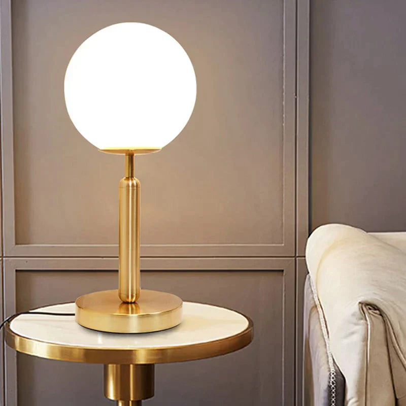 Stylish Brass & Glass LED Table Lamp – GlowSphere Noxord