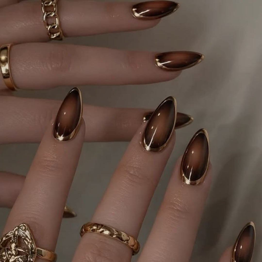Glamorous Stiletto Nails with Elegant Gold Edge Kalsten