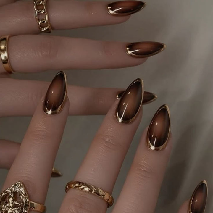Glamorous Stiletto Nails with Elegant Gold Edge Kalsten