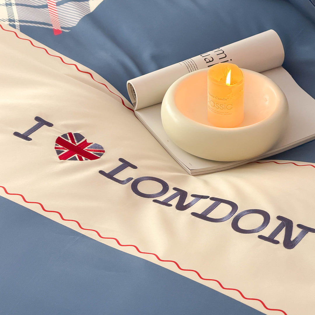Bedding set in London motif made of cotton satin with check patchwork and embroidered skyline icons Kalsten