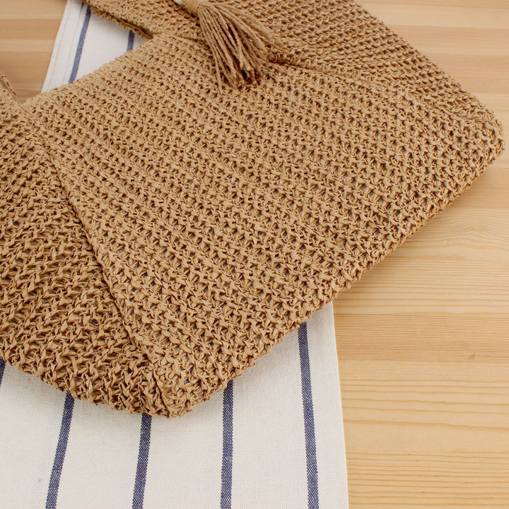 Handbag Made of Handwoven Raffia with Elegant Leather Accents Kalsten