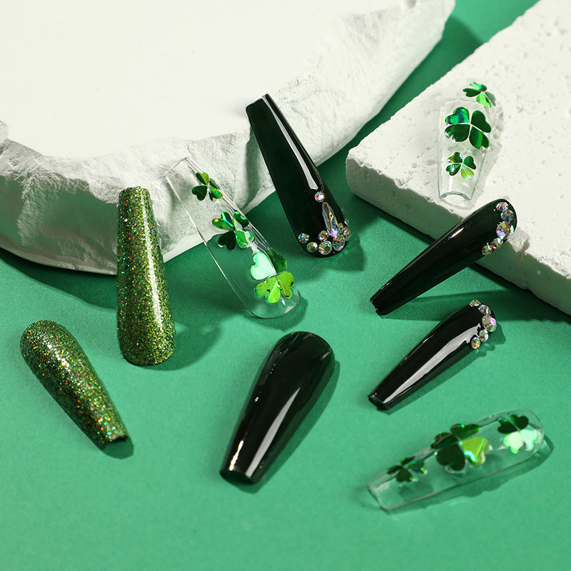 Artificial nail art with clover leaf motifs Kalsten
