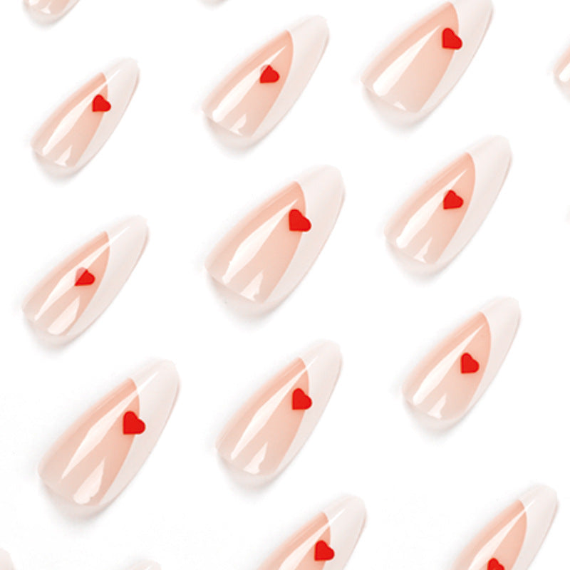 Glamorous nail art with heart decorations Kalsten