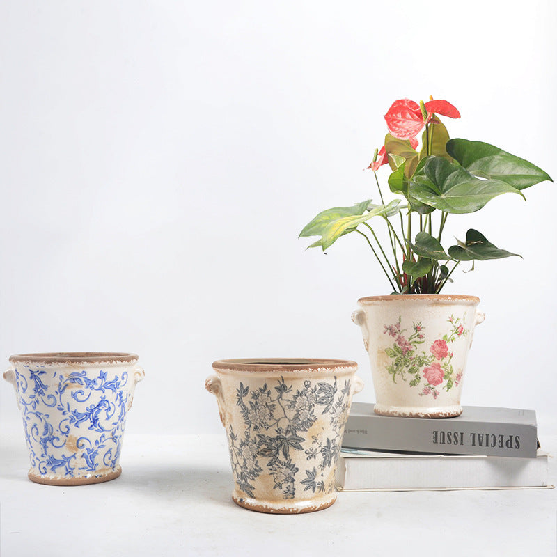 Decorative flower pot with floral embellishments Kalsten