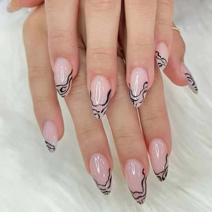 Artful stiletto nails with modern line patterns Kalsten