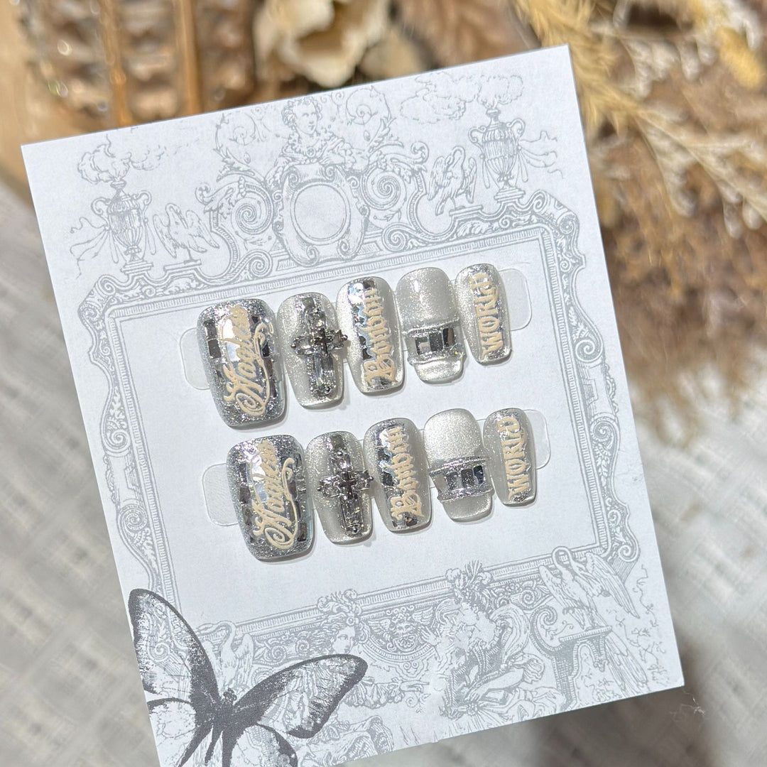 Metallic Press-On Nail Set with Decorative Silver Accents Kalsten