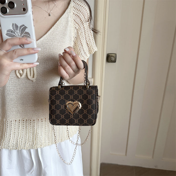 Elegant Heart-Embellished Handbag