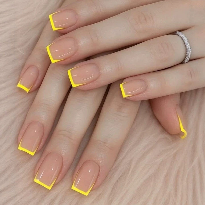 Nail set with modern French tips and striking neon accents Kalsten