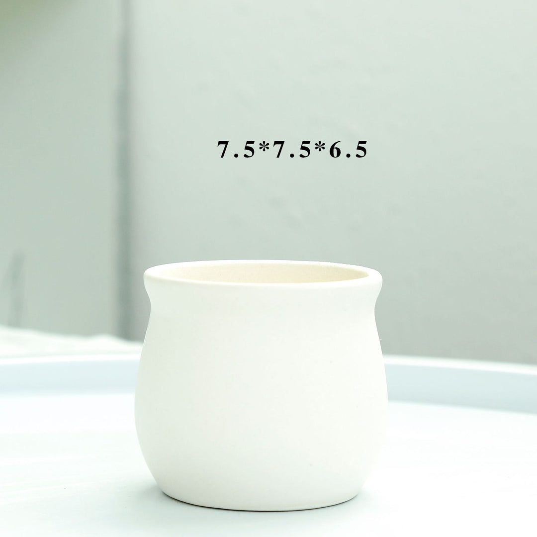 Modern Round Ceramic Planter Kalsten