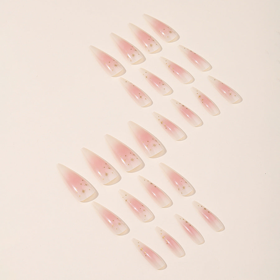 Acrylic nail set with delicate ombre design and glamorous star accents Kalsten