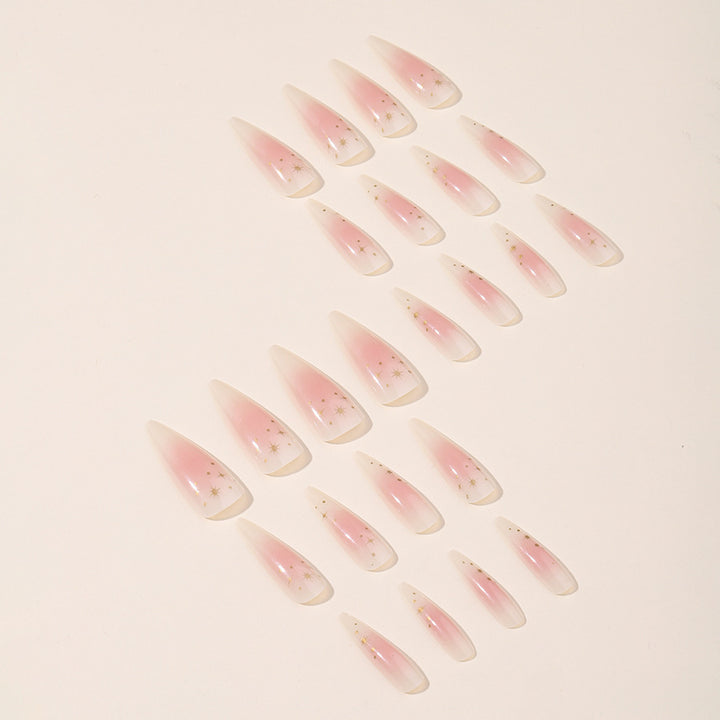 Acrylic nail set with delicate ombre design and glamorous star accents Kalsten