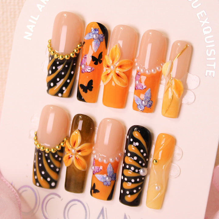 Artificial nail set with elegant flower and butterfly designs Kalsten