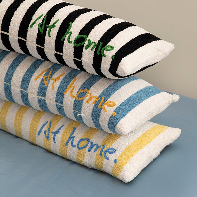 Elongated bench and windowsill cushion with nautical stripe texture and embroidered lettering Kalsten