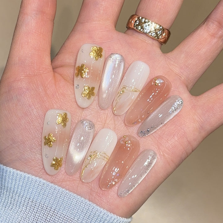 Artificial nails with floral decorations and glitter effects Kalsten