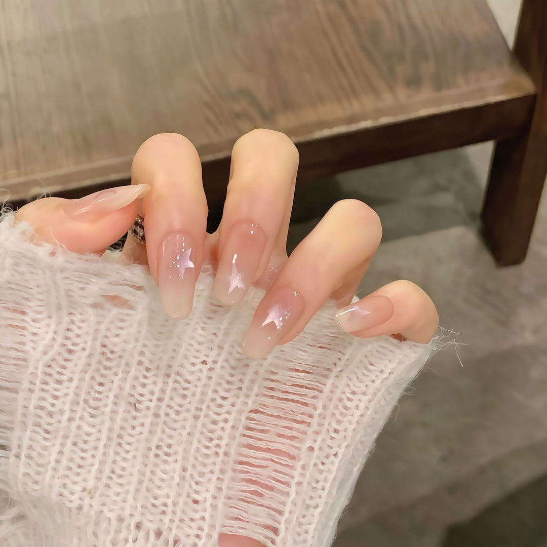 Artificial nails with sparkling stars and gentle gradient Kalsten