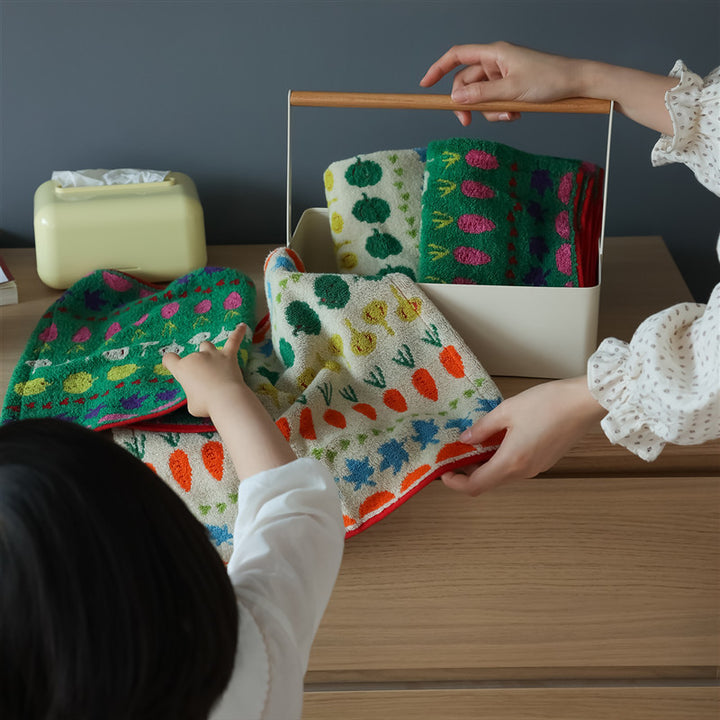 Highly absorbent terry kitchen towel with cheerful vegetable and flower design