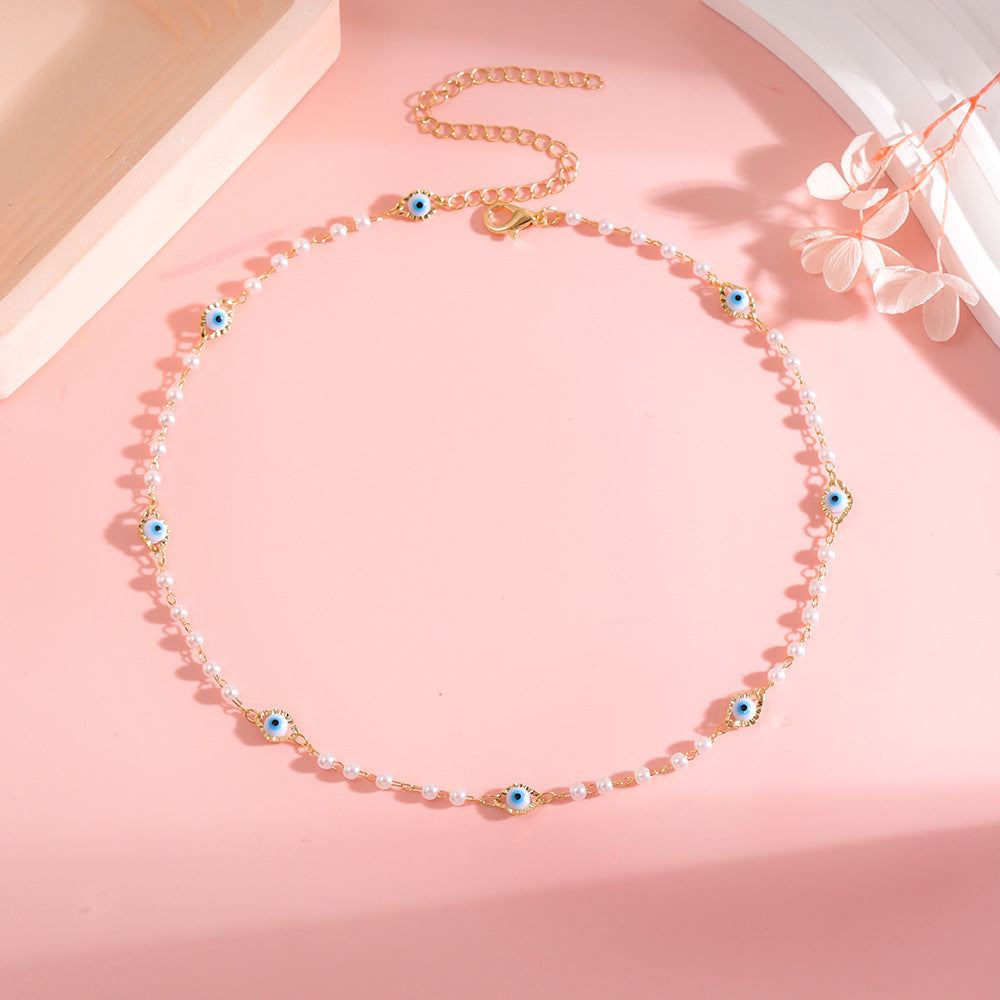 Elegant Pearl and Eye Charm Necklace Kalsten