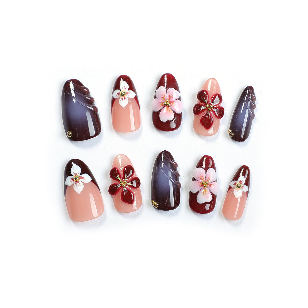 Acrylic nail set with floral accents and luxurious decorations Kalsten