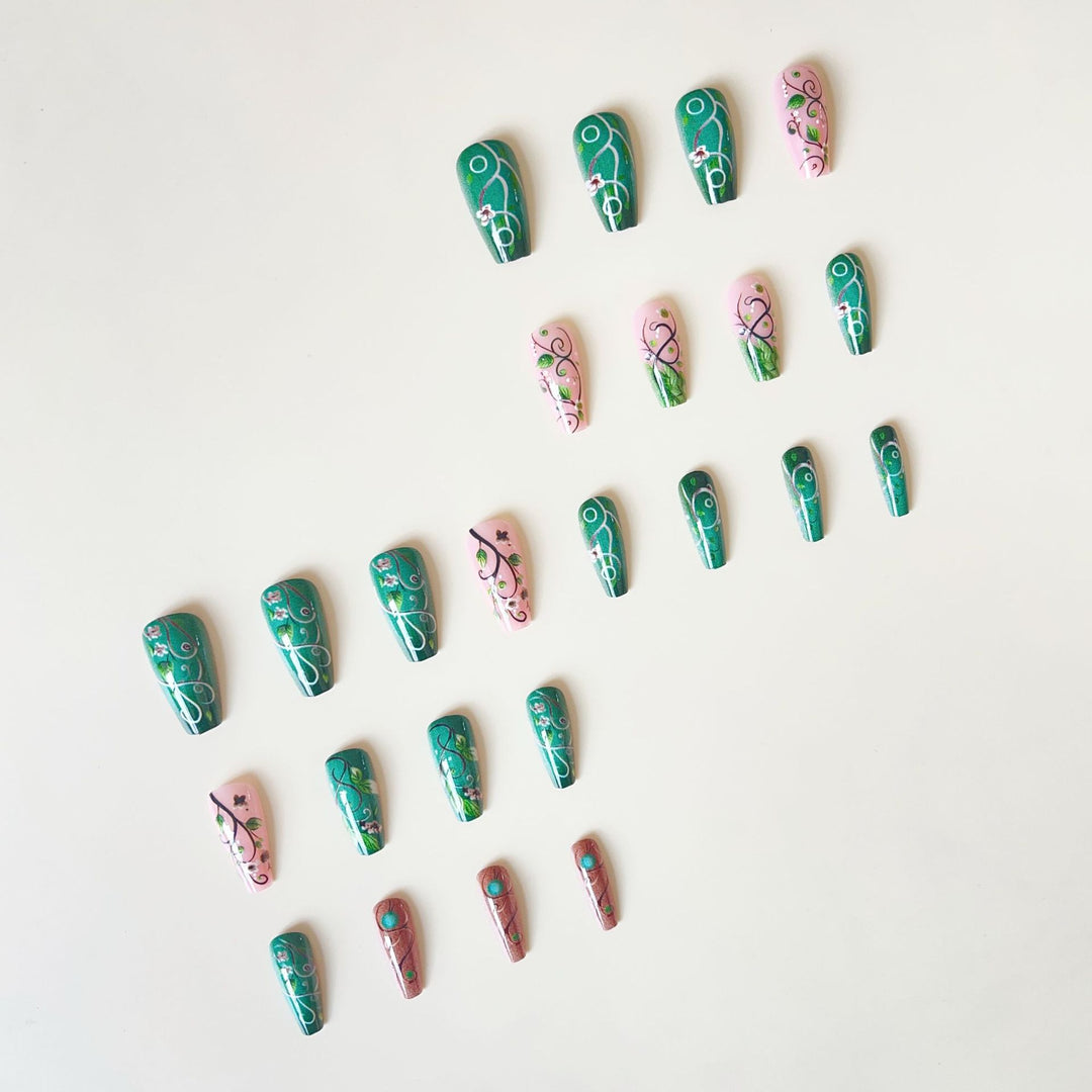 luxurious artificial nail set with floral designs and detailed accents Kalsten