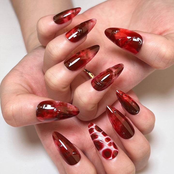 Artful stiletto nails in trendy design Kalsten