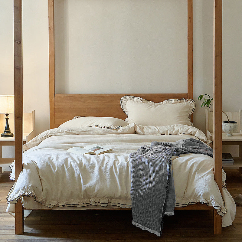 Linen-cotton bedding set with ruffled edge and throw blanket