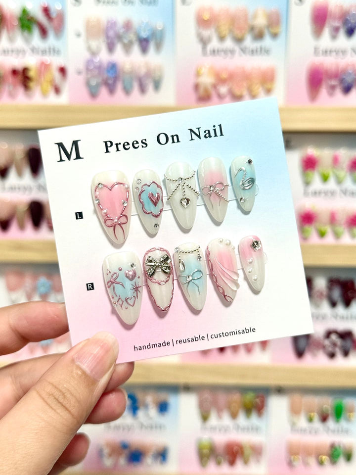 Artistic Press-On Nail Set with Floral and Green Accents