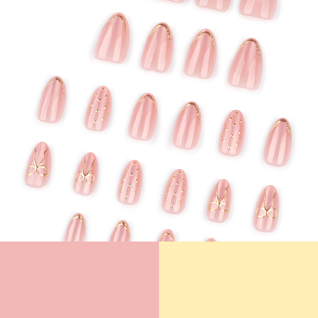 Artful nail extensions with elegant golden accents Kalsten