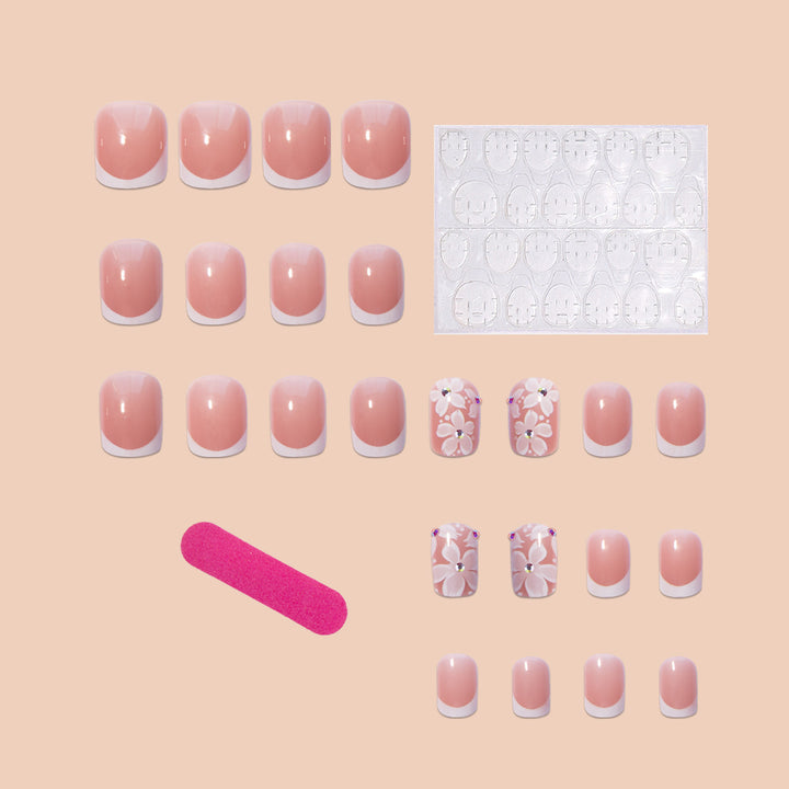 Artificial nail set with elegant French design and floral accents Kalsten