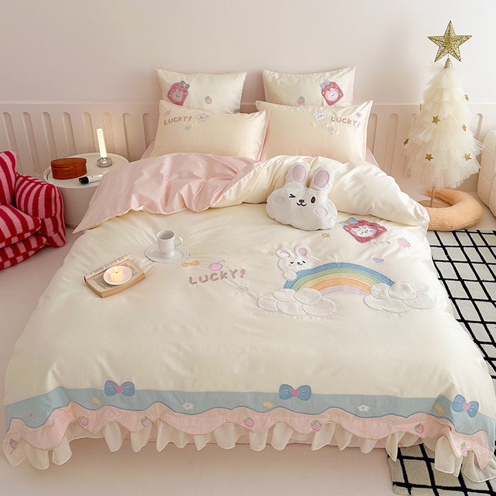 Playful cotton bedding set with appliqués and ruffles