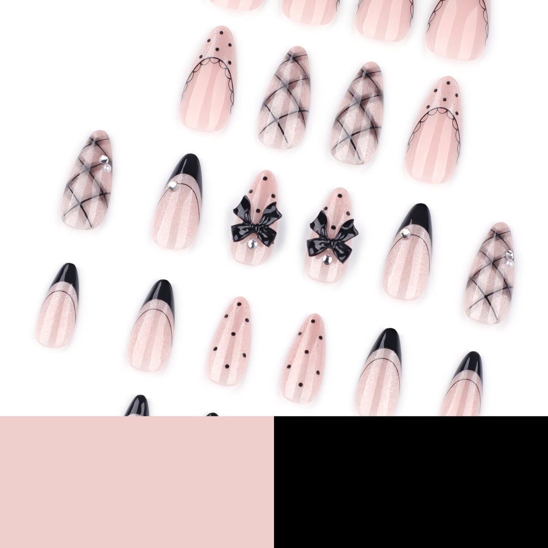 Artful Nail Art with Bow and Rhinestone Decorations Kalsten