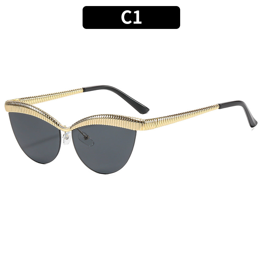 Elegant Cat-Eye Sunglasses with Metallic Accents