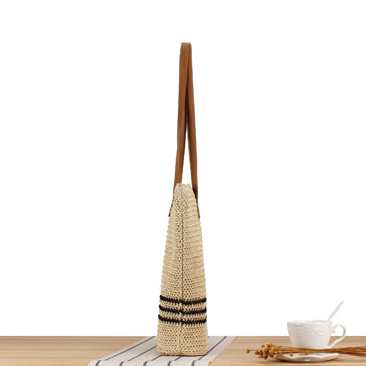 Stylish beach bag made of natural weave with leather handles Kalsten