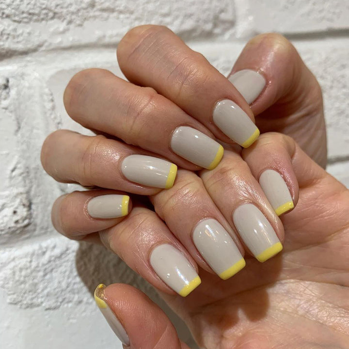 Artistic nail extensions with modern French-tip design Kalsten