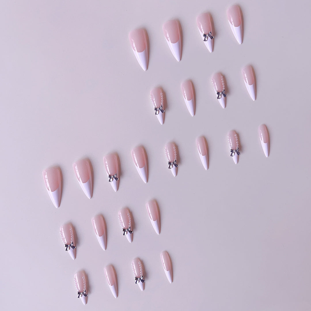 Elegant artificial nail set with 3D rhinestone details and pointed accents Kalsten