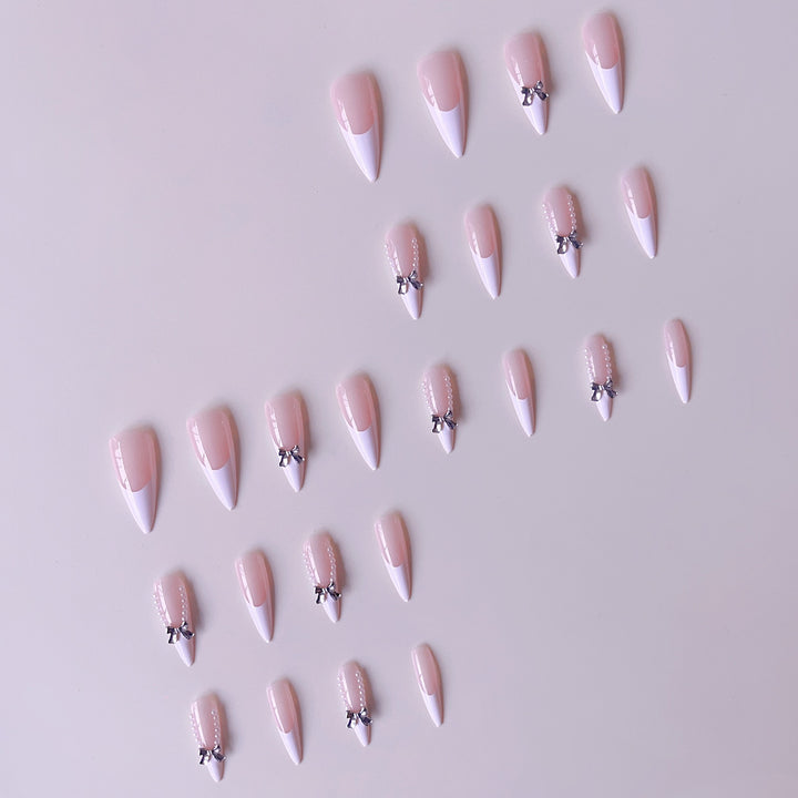 Elegant artificial nail set with 3D rhinestone details and pointed accents Kalsten