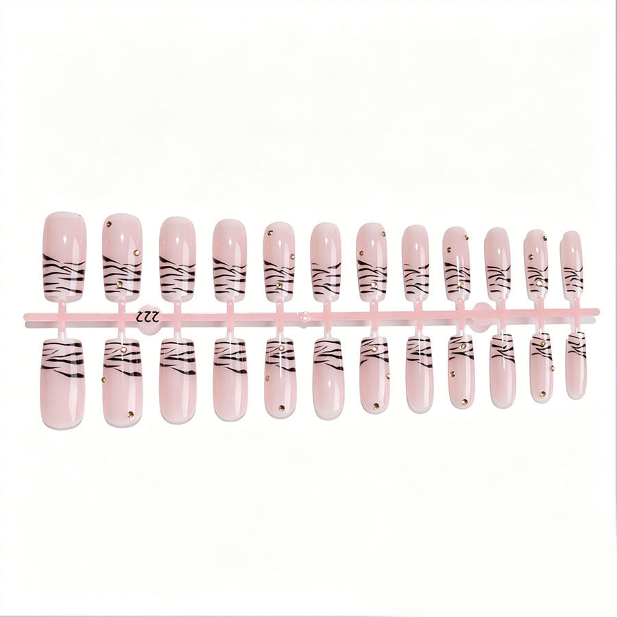 Art nail set with elegant lines and glitter accents Kalsten
