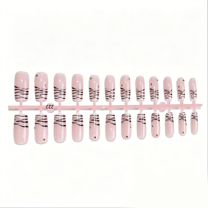 Art nail set with elegant lines and glitter accents Kalsten