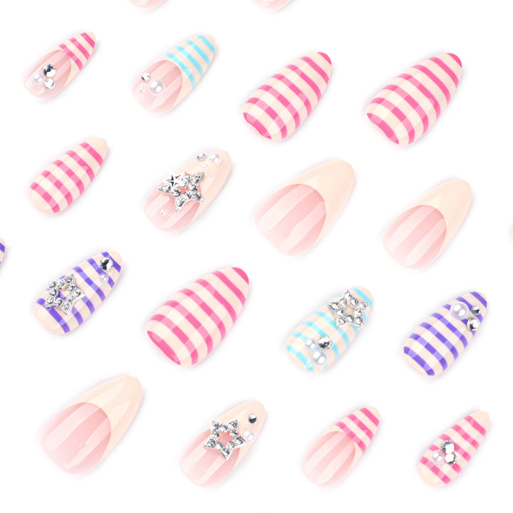 Artistic acrylic stiletto nails with glitter and star embellishments Kalsten