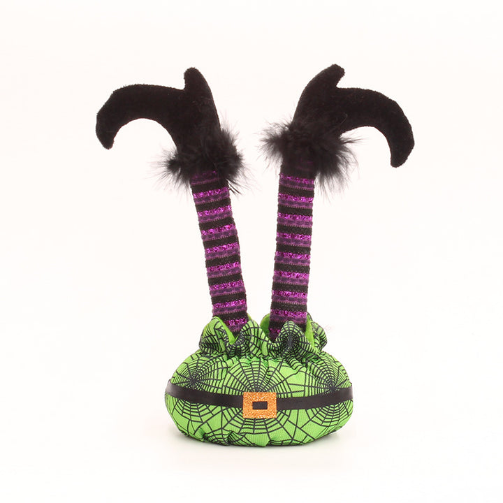 Skurrile Halloween table figure with standing witch legs and spider web sack