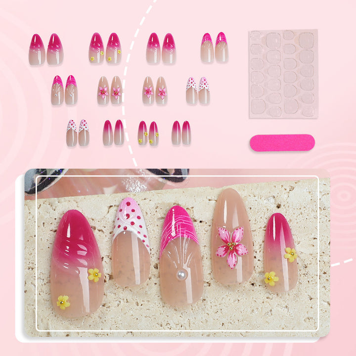 Artful nail tips with delicate floral embellishments Kalsten
