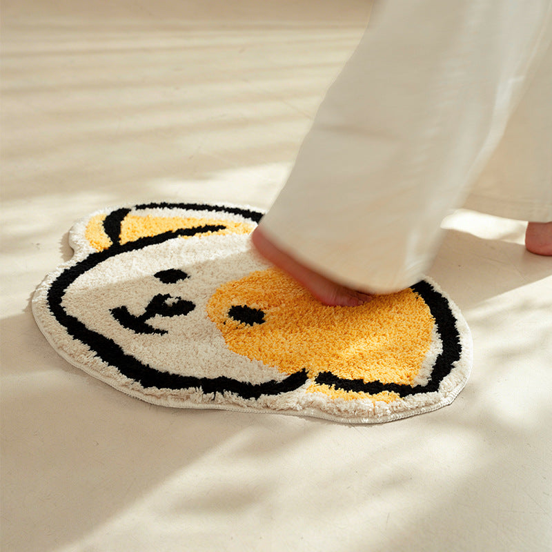 Playful children's rug in cheese shape with tufted chenille surface and non-slip backing Kalsten